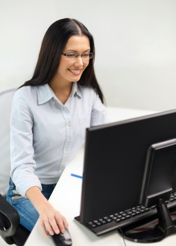 smiling businesswoman or student with eyeglasses