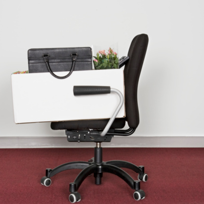 Office Chair and Box Containing Personal Effects