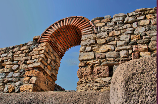 Ancient city ruins stone arc