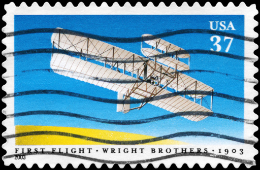 "A Stamp printed in USA shows the First Flight of Wright Brothers, Century issue, circa 2003"