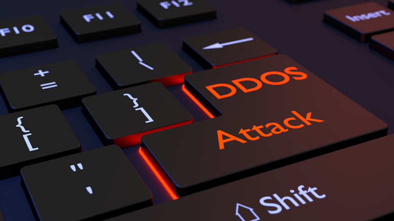 Black computer keyboard with the words DDOS attack on the enter key distributed denial of service concept 3D illustration